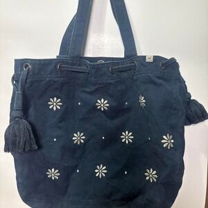 Navy blue Hollister canvas tote bag with white floral embroidery and tassels